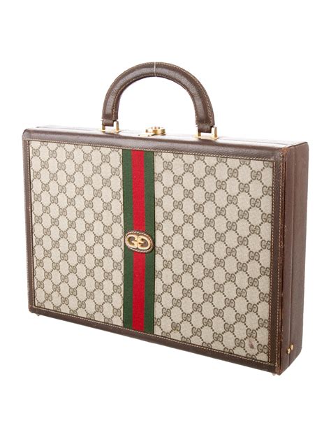 rolling gucci brief case|Gucci leather briefcase.